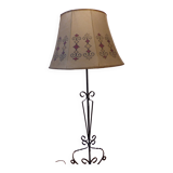 Tripod floor lamp with metal base and skin shade