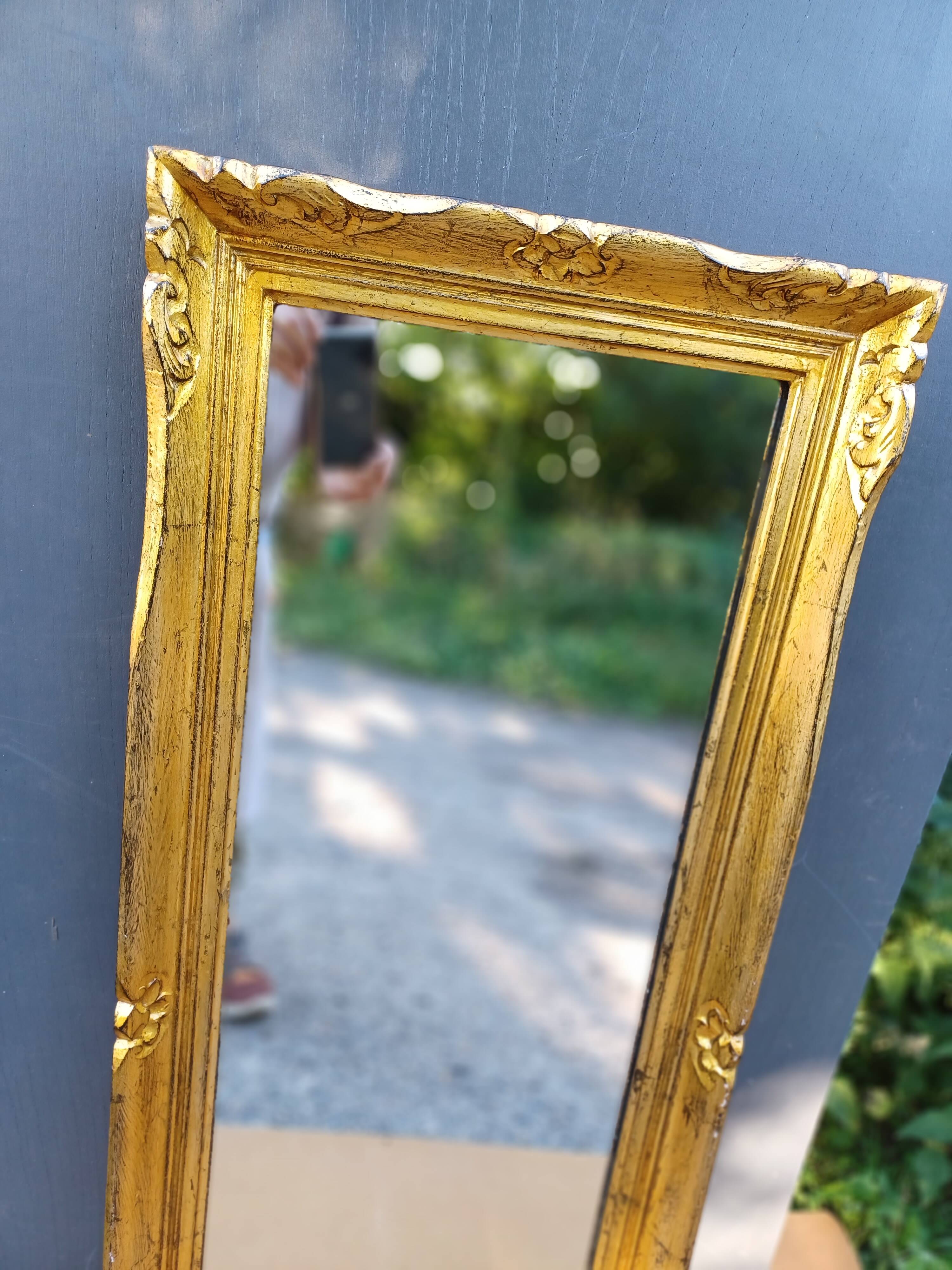 NARROW GOLDEN MIRROR IN LOUIS XV STYLE