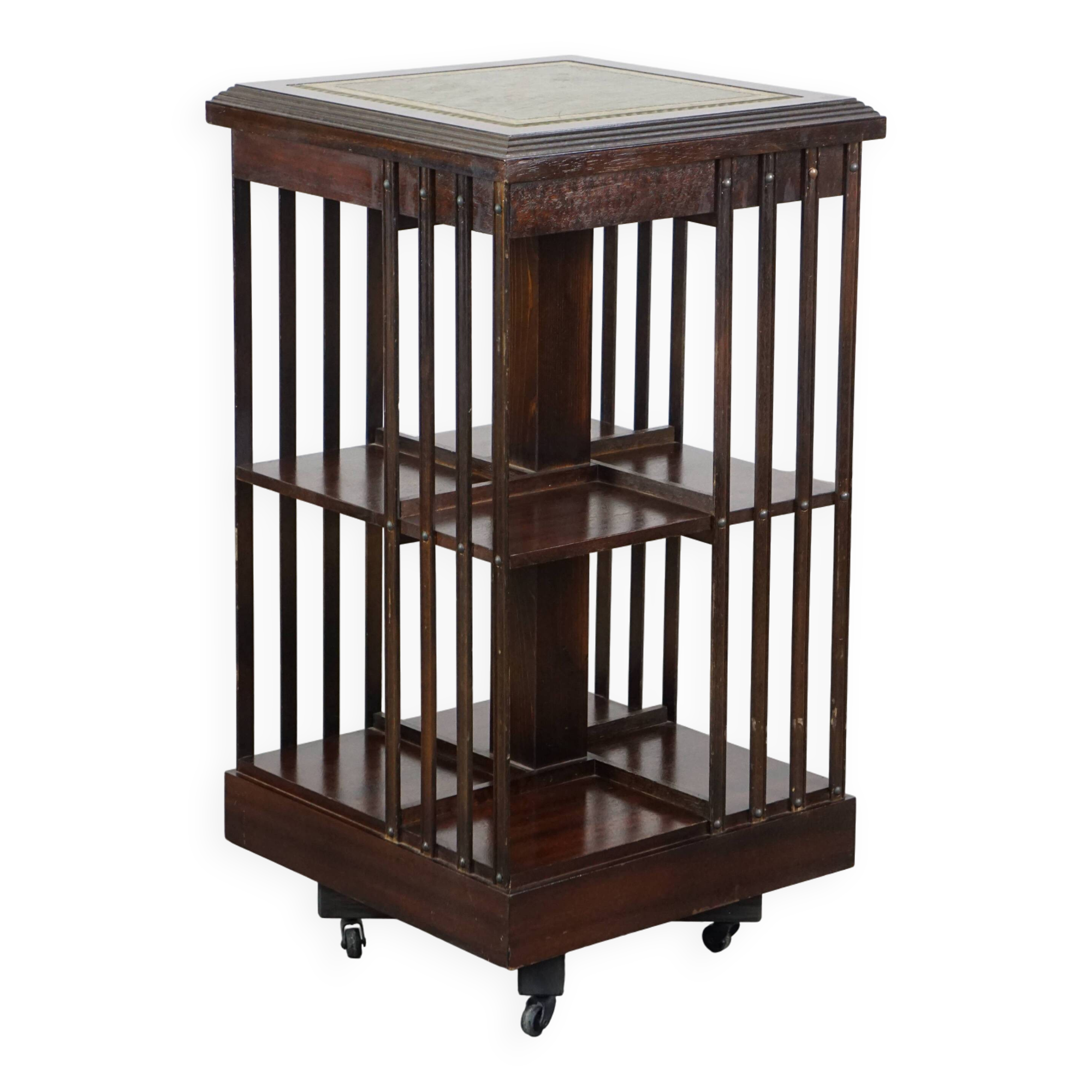 Wooden bookstand with green leather surface and on wheels in English style