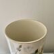 Roller vases in earthenware with floral decoration of wild rose, circa 1930–1950.