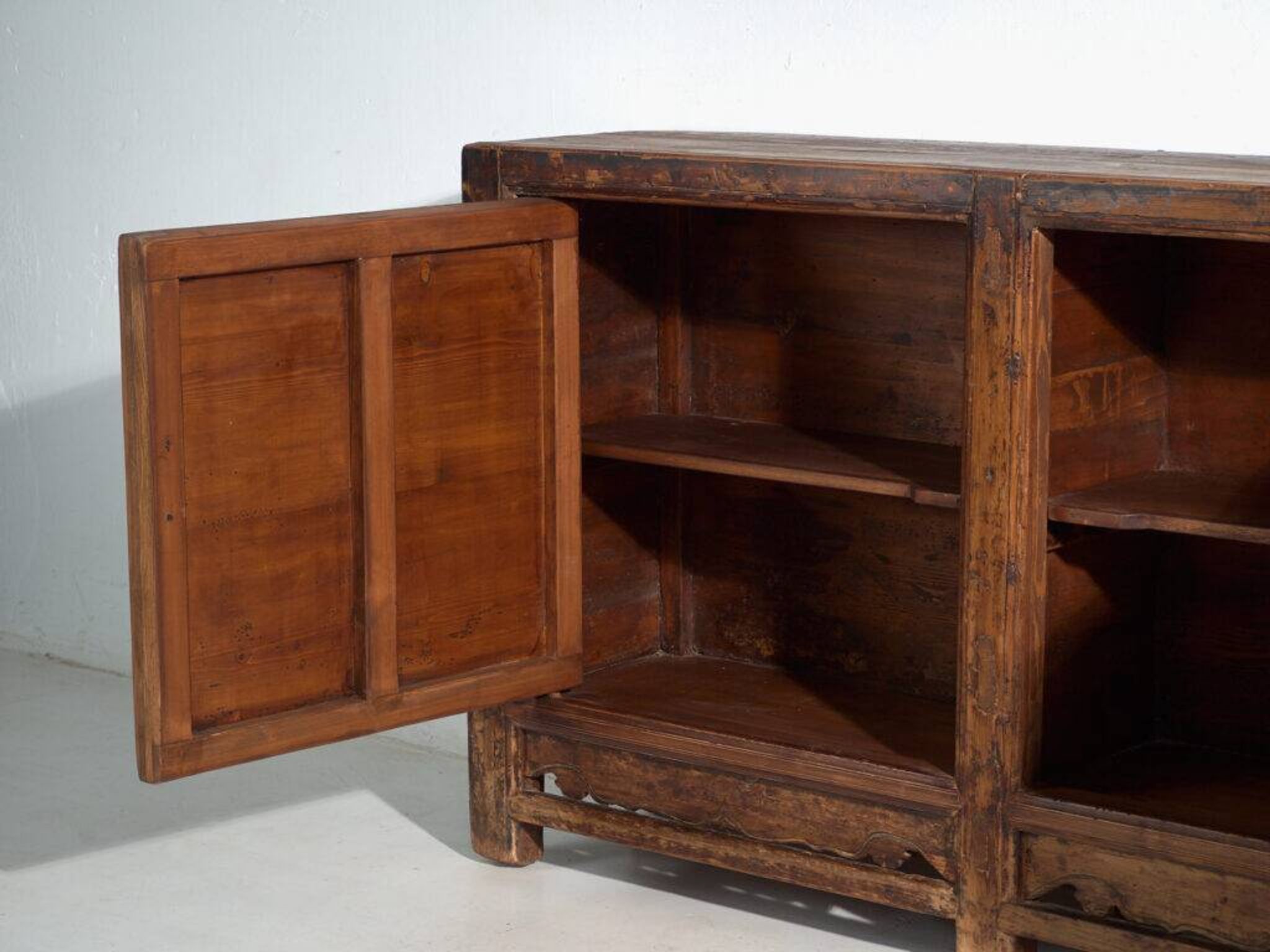 Pine buffet with two doors and scalloped panels – China, circa 1950