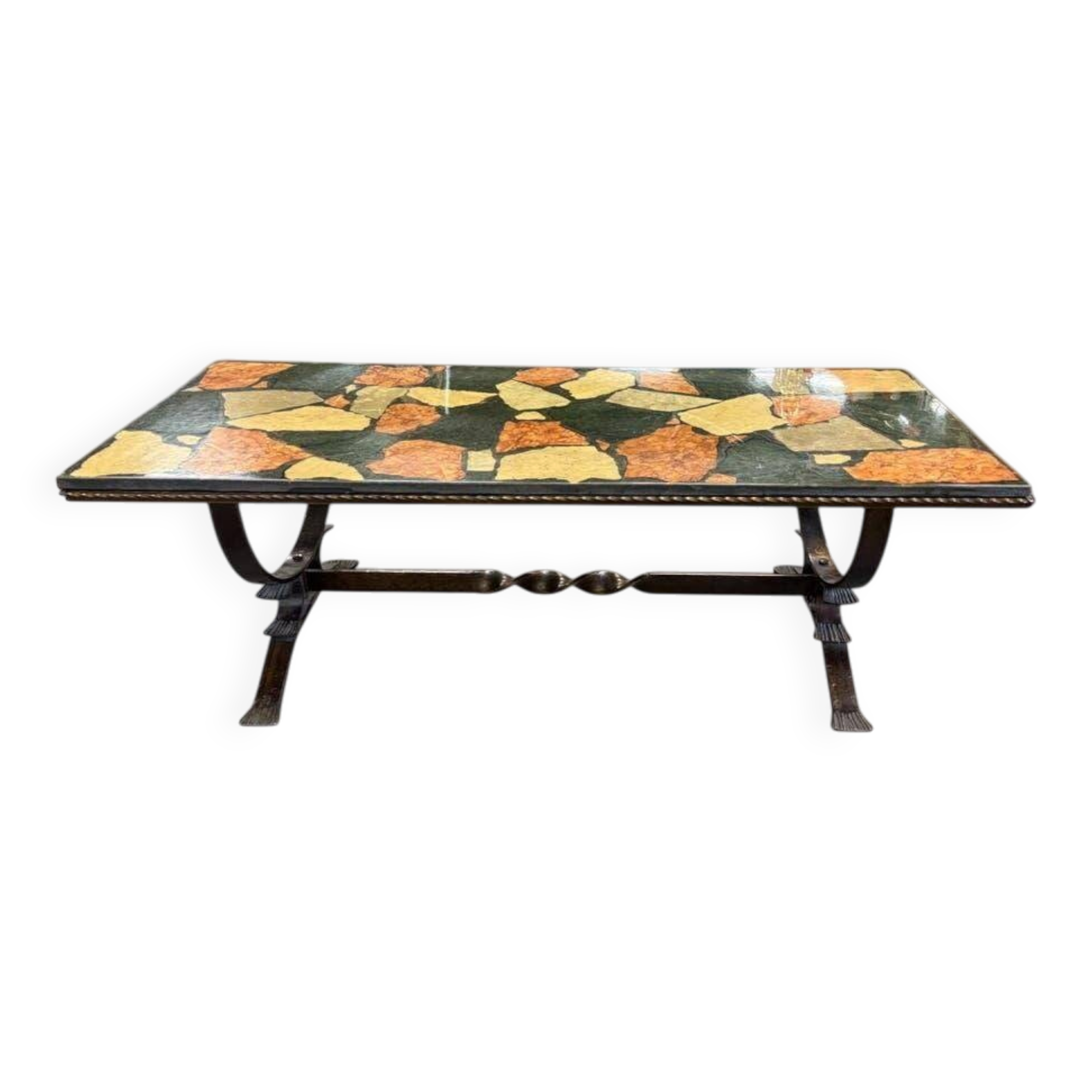 Vintage stone coffee table with a cast iron frame.