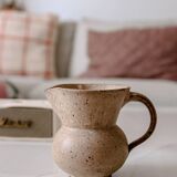 Small pitcher in old speckled stoneware