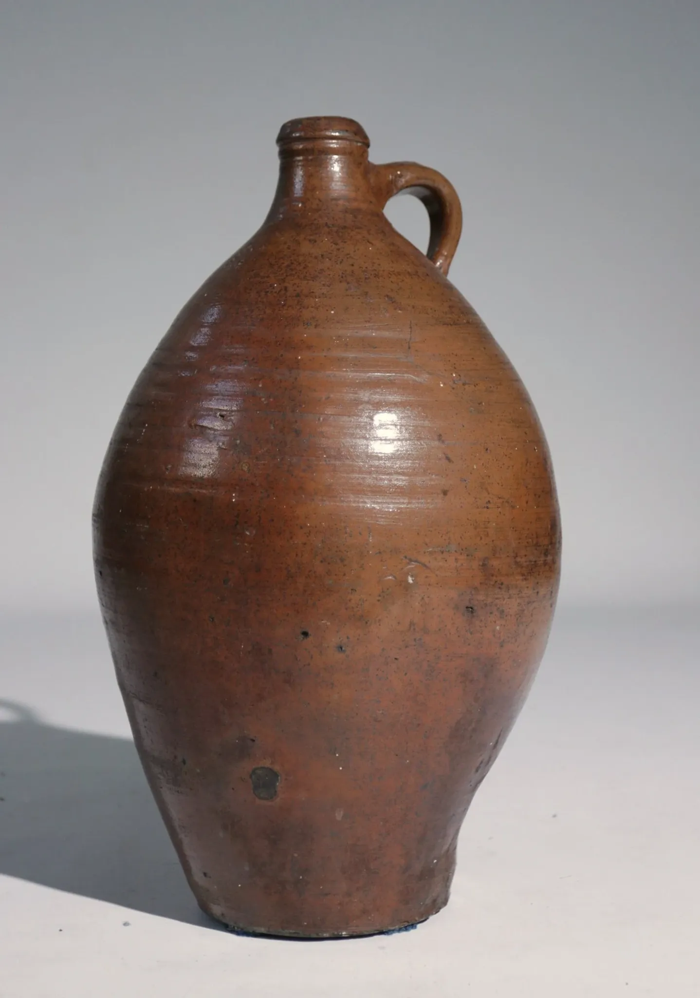 Brown stoneware jug with handle – 19th century