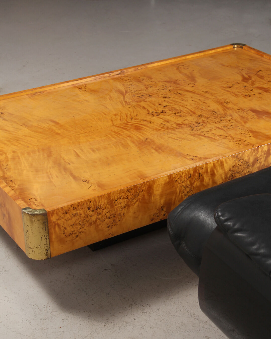 Coffee table in magnifying glass and brass