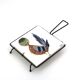 Square ceramic trivet with a bird by Jean Pierre Caffarelli.