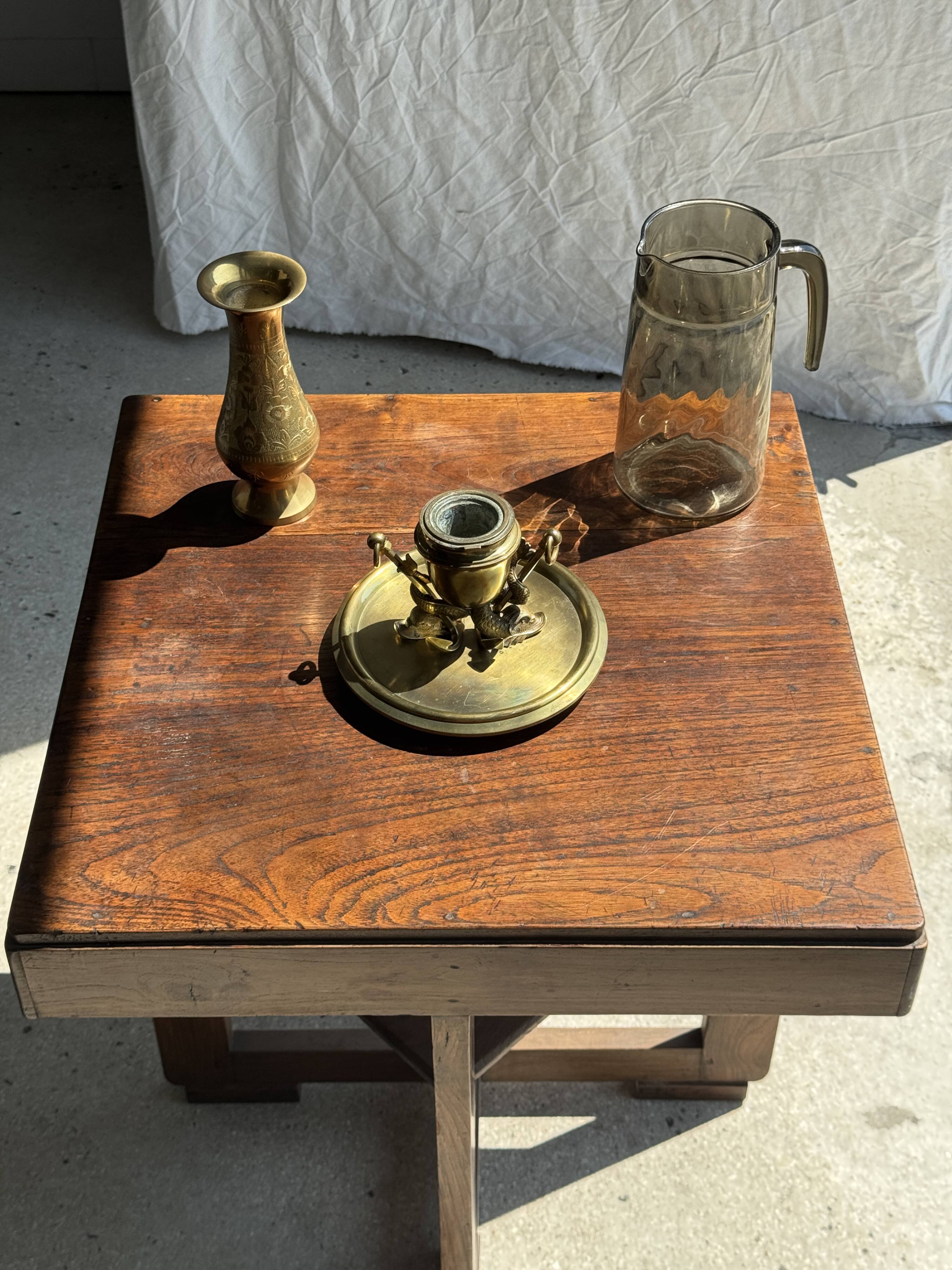 Large 19th century brass candlestick with dolphin motifs