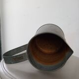 Bent zinc garden pitcher