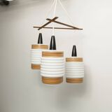 Scandinavian triangle pendant light in cascade with 3 opalines