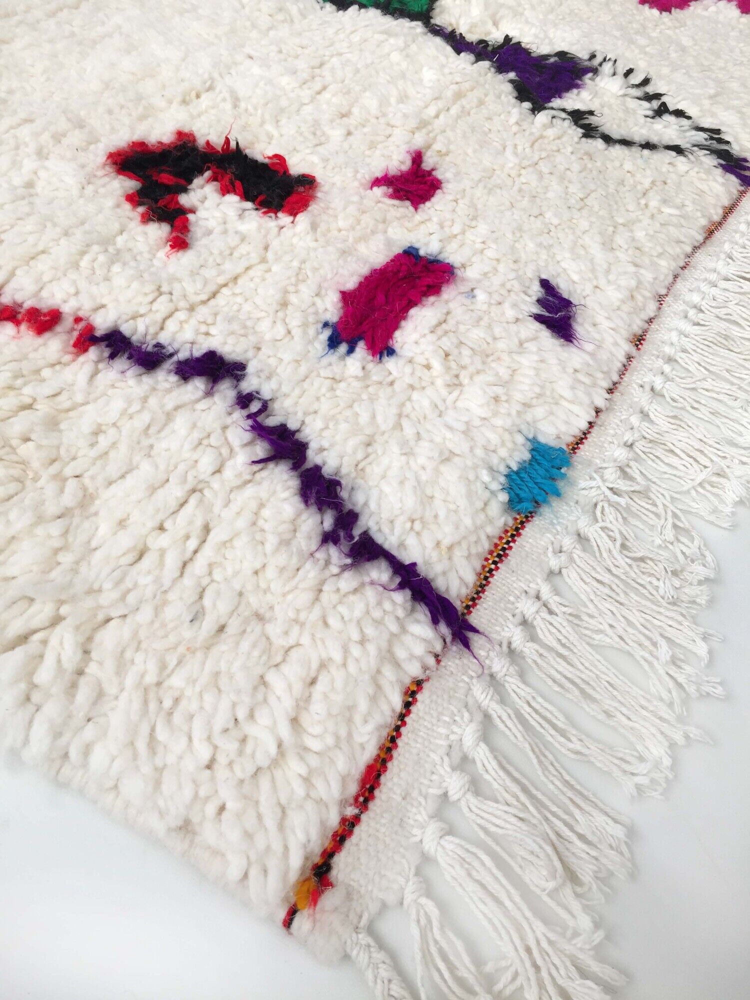 Moroccan Berber carpet Azilal unbleached with colored patterns 242x159cm