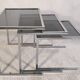 Set of 3 vintage nesting tables in chrome and smoked glass, Roche Bobois style.