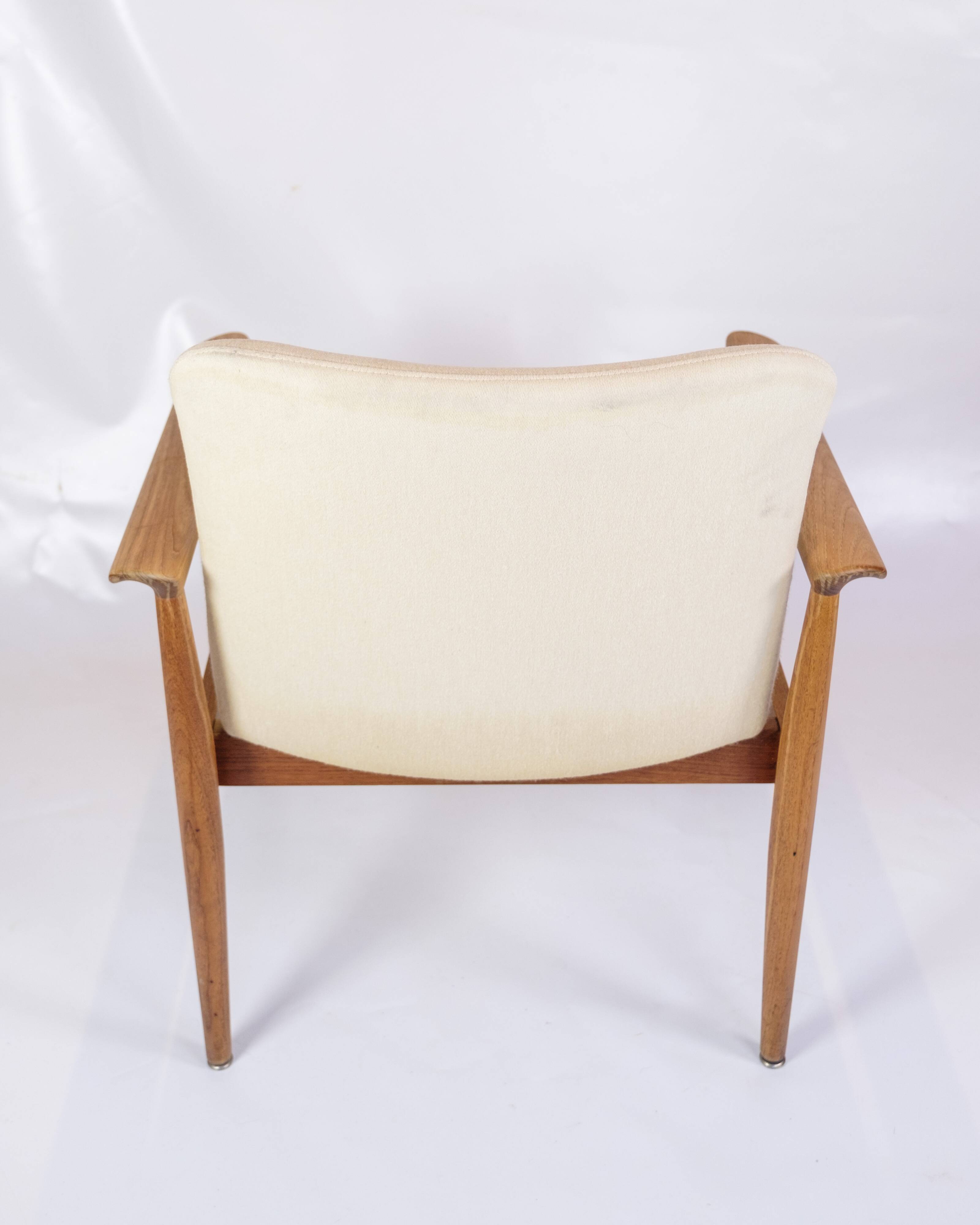 Ensemble de 2 chaises diplomates fabriquées en teck et en tissu de laine légère par Finn Juhl des années 1960