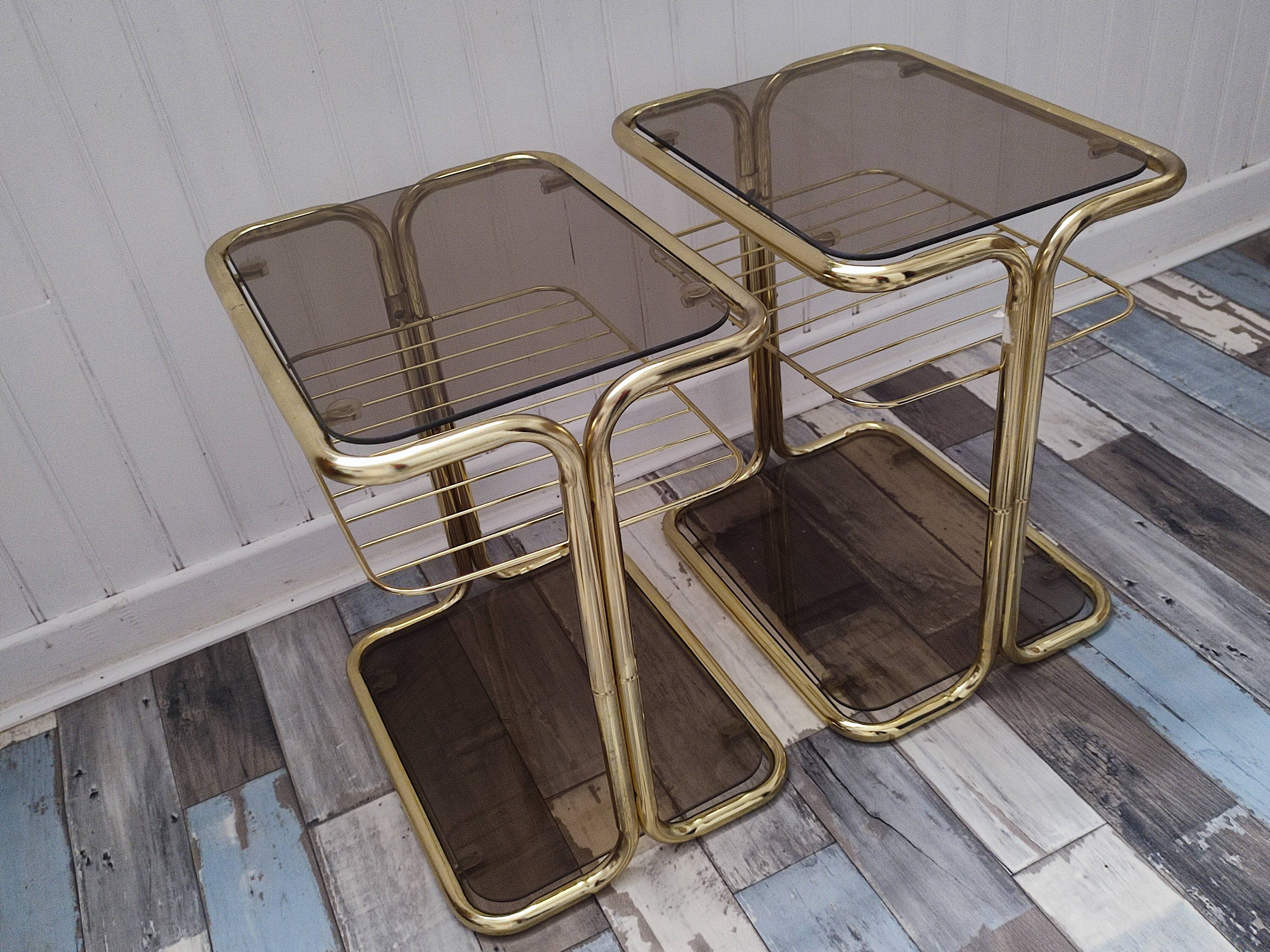 Pair of vintage smoked glass and brass bedside tables