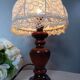 Table lamp with romantic wood and lace ambiance, retro chic