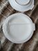 12 flat plates in earthenware/fish