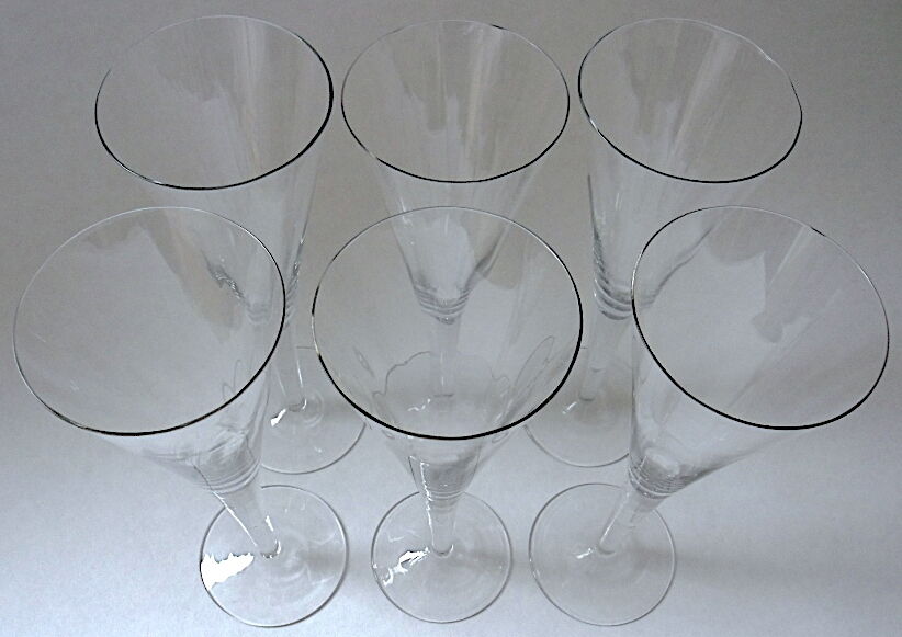 Suite of six colorless crystal champagne flutes