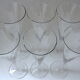 Suite of six colorless crystal champagne flutes