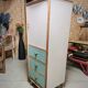 Asymmetrical compass foot cabinet