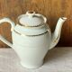 Antique porcelain jug with Limoges enamel