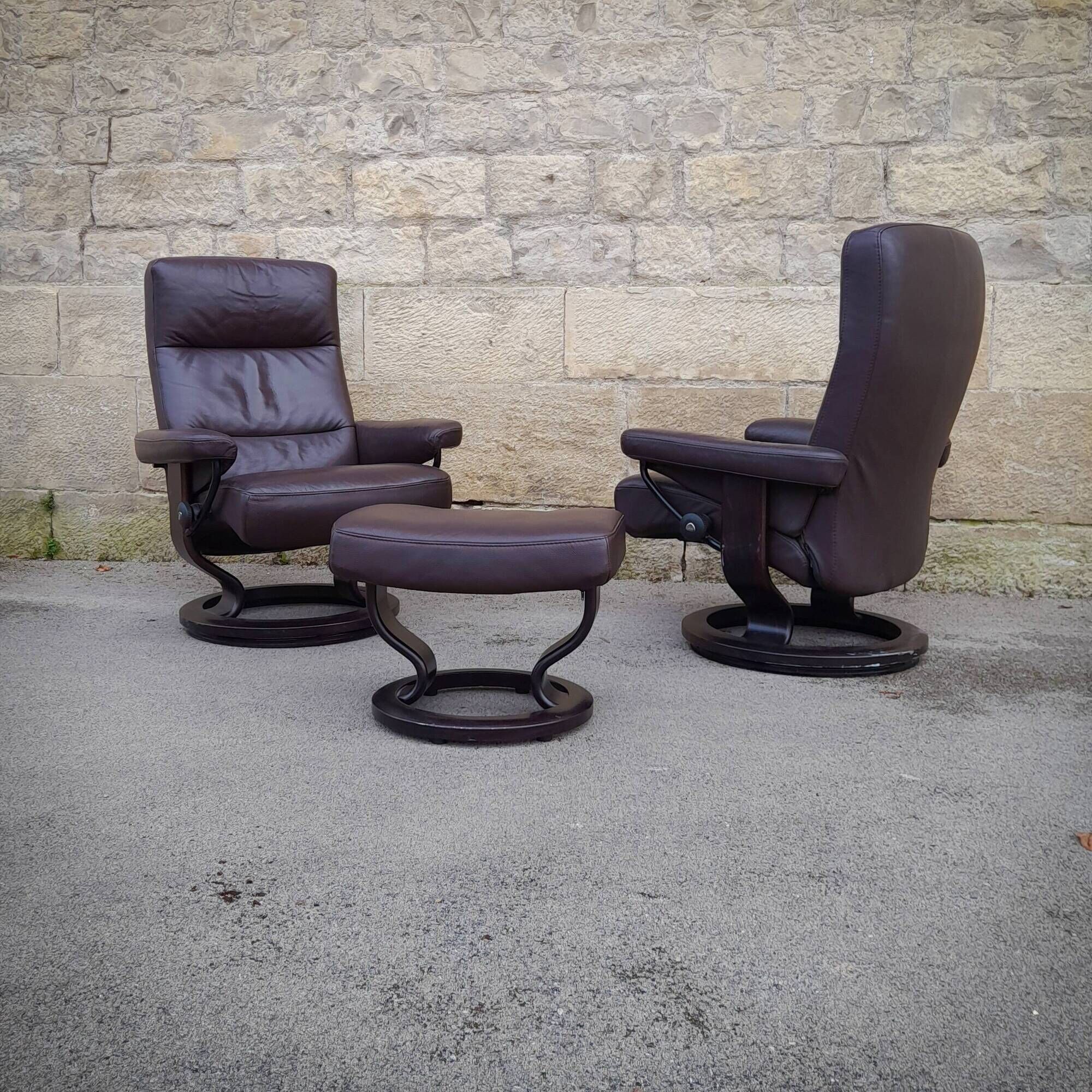 Pair of Scandinavian leather armchairs and ottoman, Ekornes, Norway, 1970
