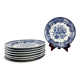 Set de 8 assiettes plates en faïence bleue, décor floral et oiseaux, XXe