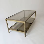 vintage brass coffee table with smoked glass mirror, antique Maison Jansen