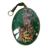 Frame medallion bouquet of dried natural flowers butterfly feather domed glass