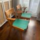 Lot de deux fauteuils Bridge Skaï pieds compas. Fauteuils scandinave vintage.