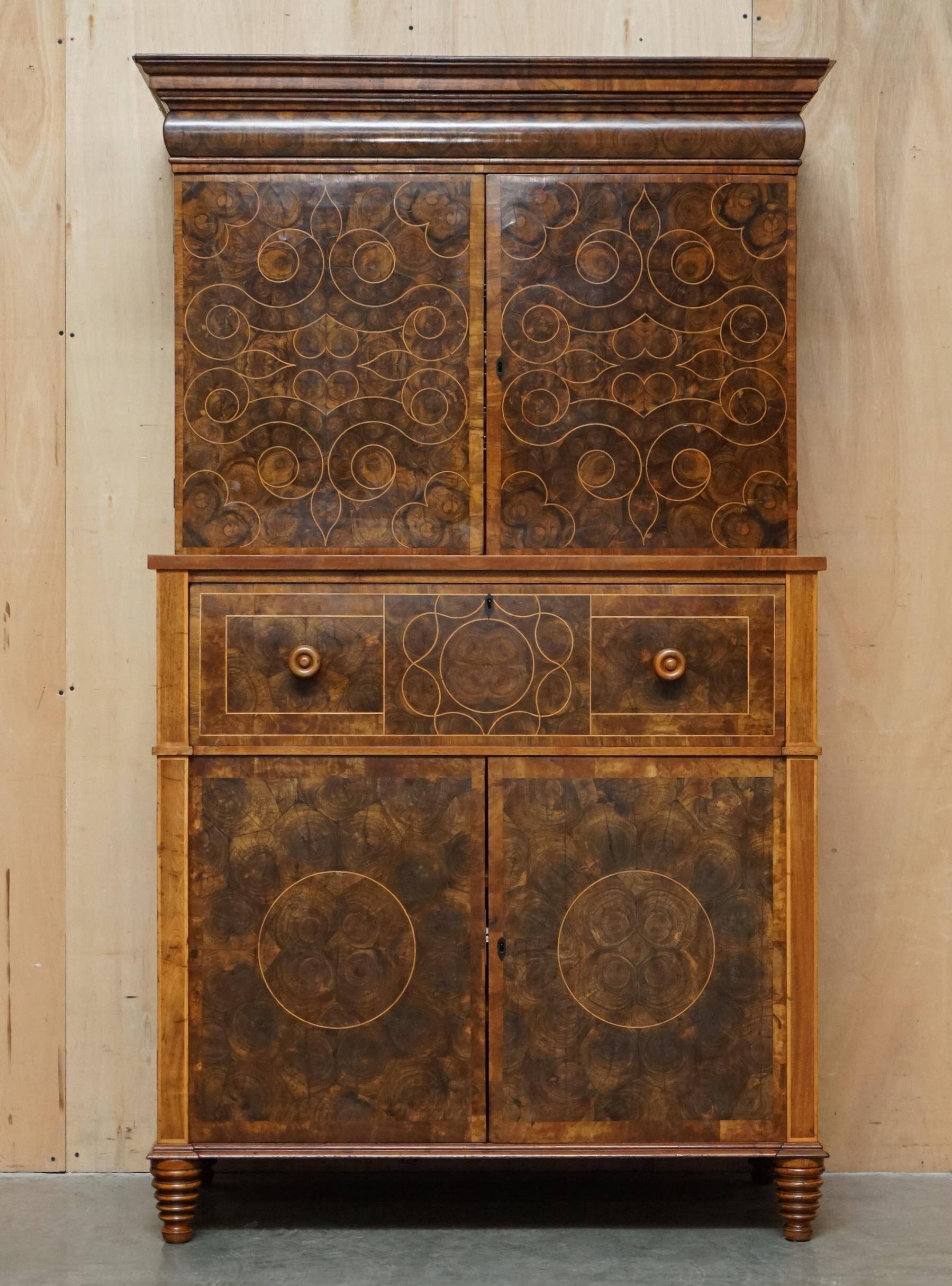 Queen Anne style pedestal commode from around 1710 in walnut and oyster veneer.