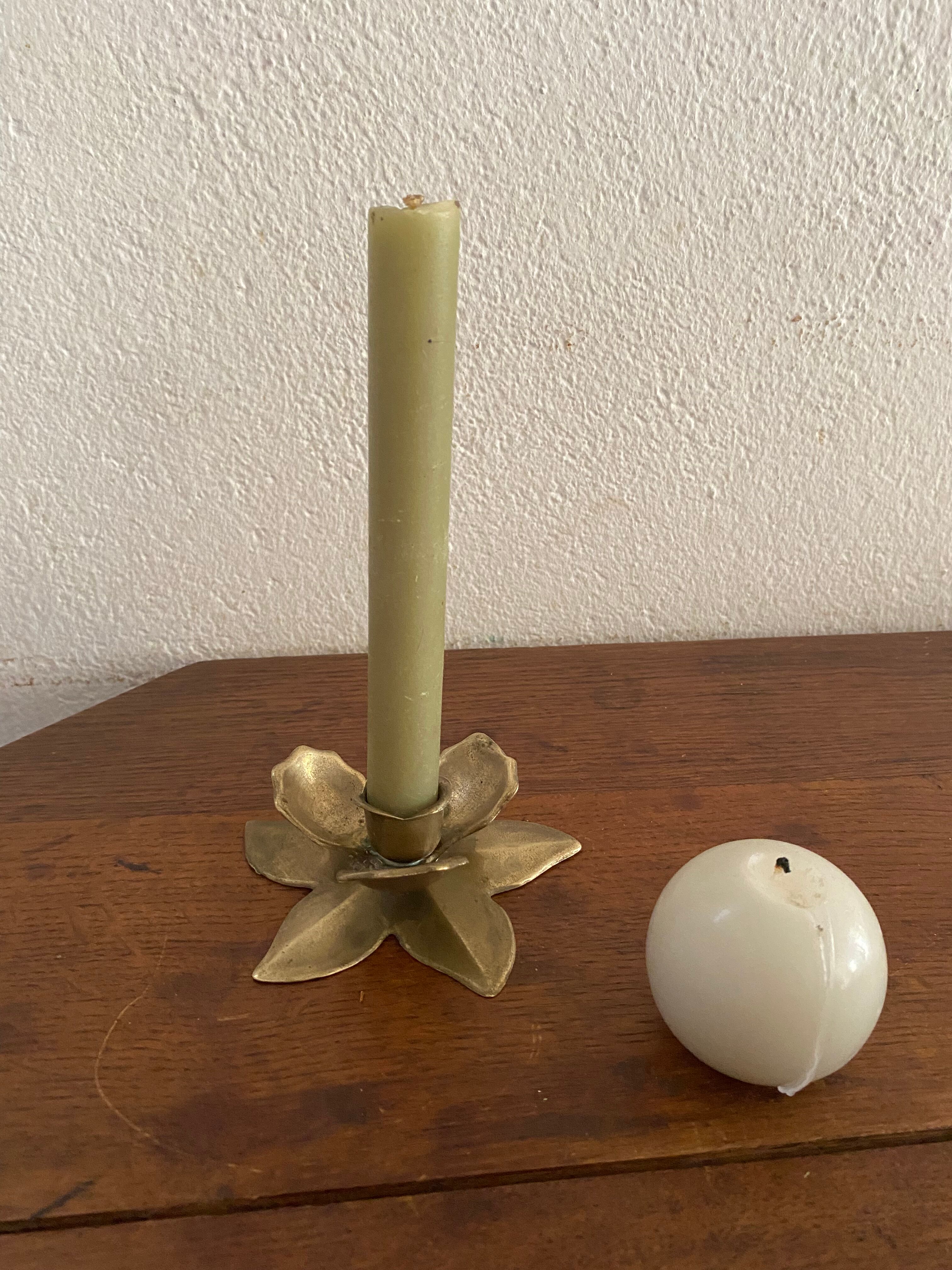 Brass flower candle holder.
