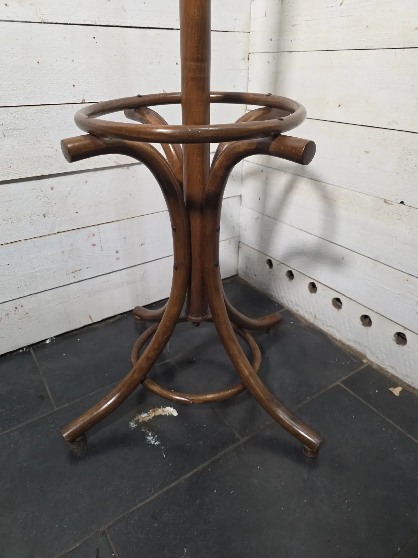 Curved antique wooden parrot