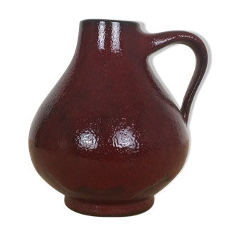 Red ceramic vase with handle