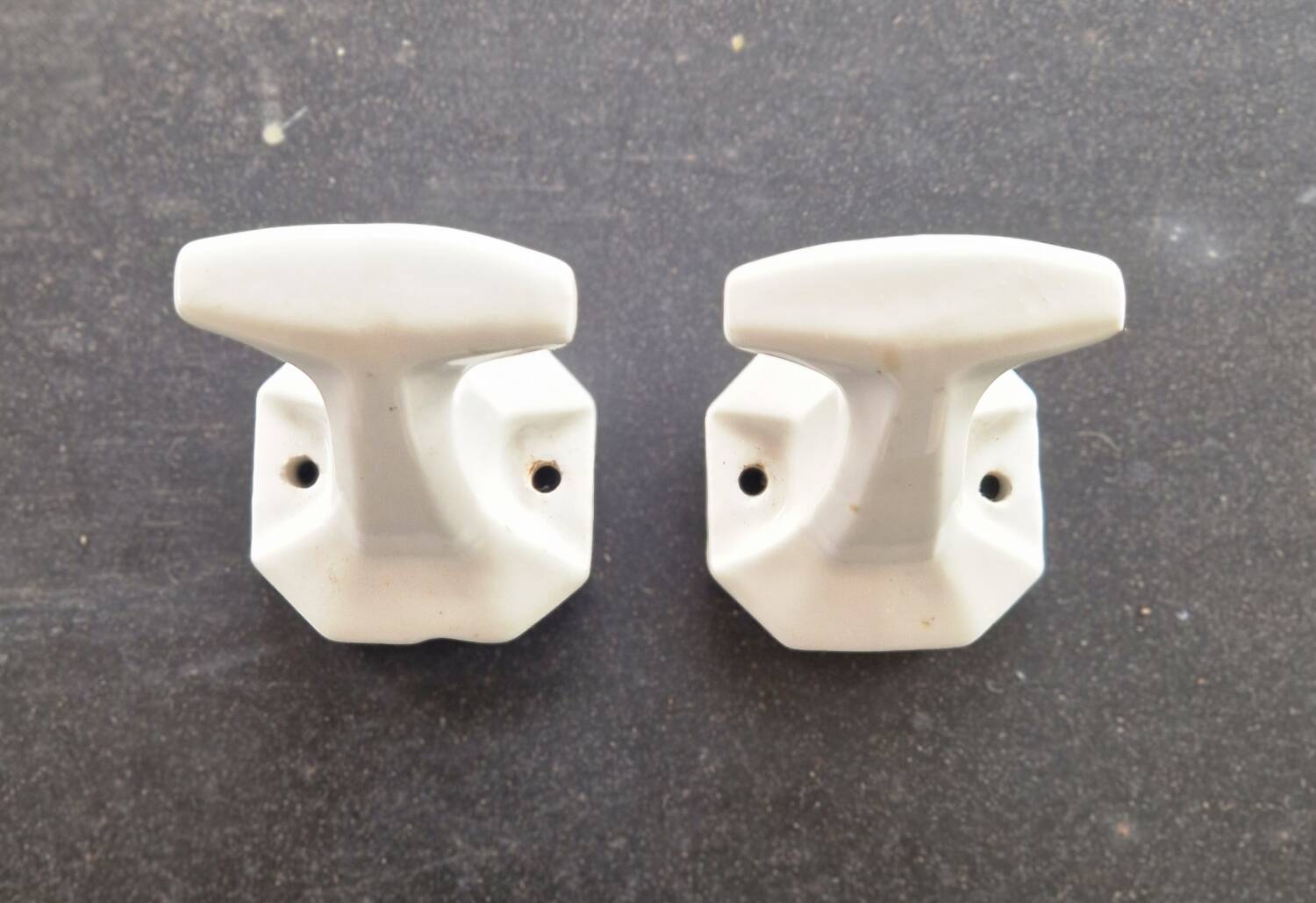 Pair of porcelain hooks