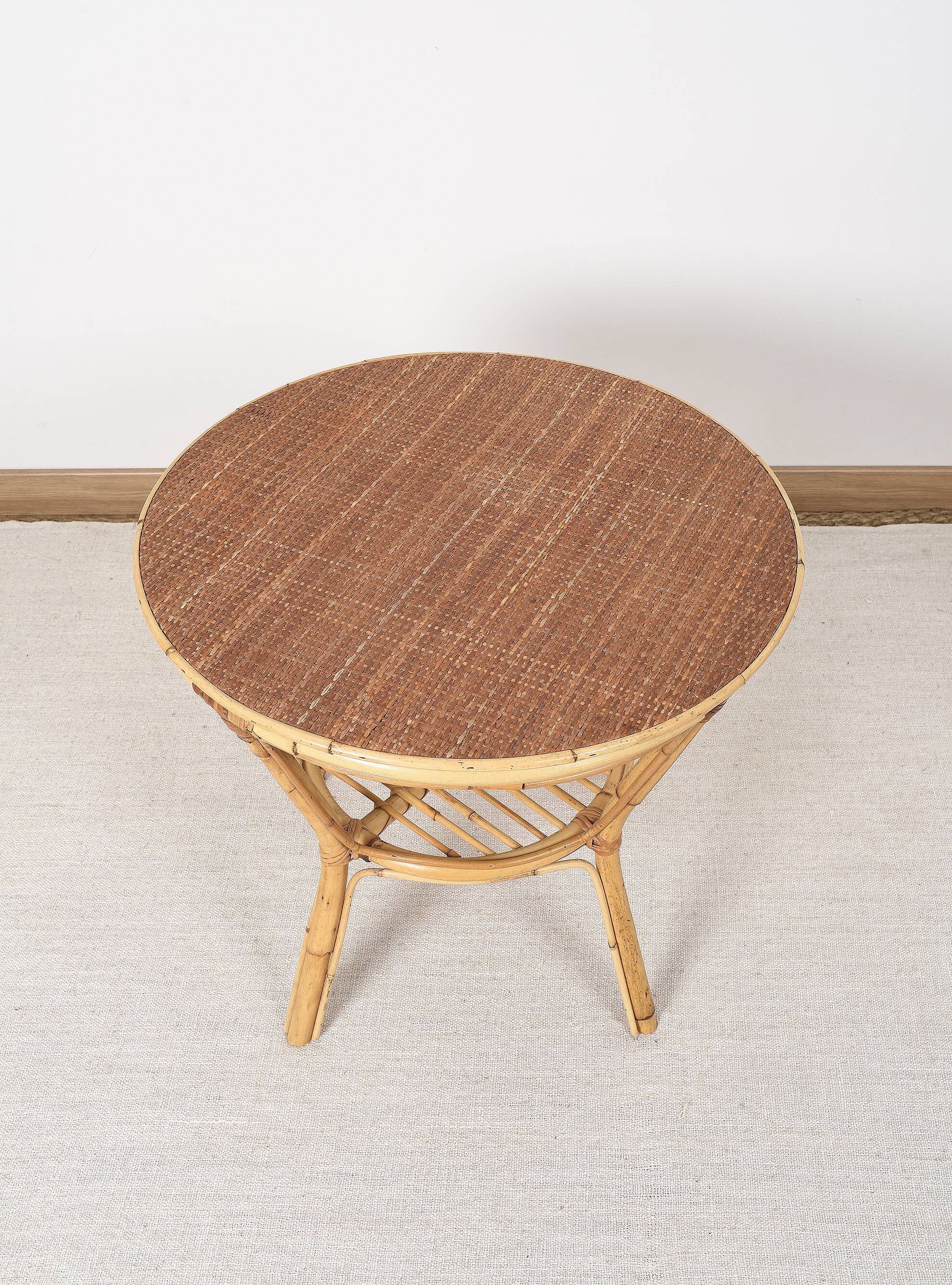 Old round rattan table, vintage from the 70s - 80s. Small table, or side table.