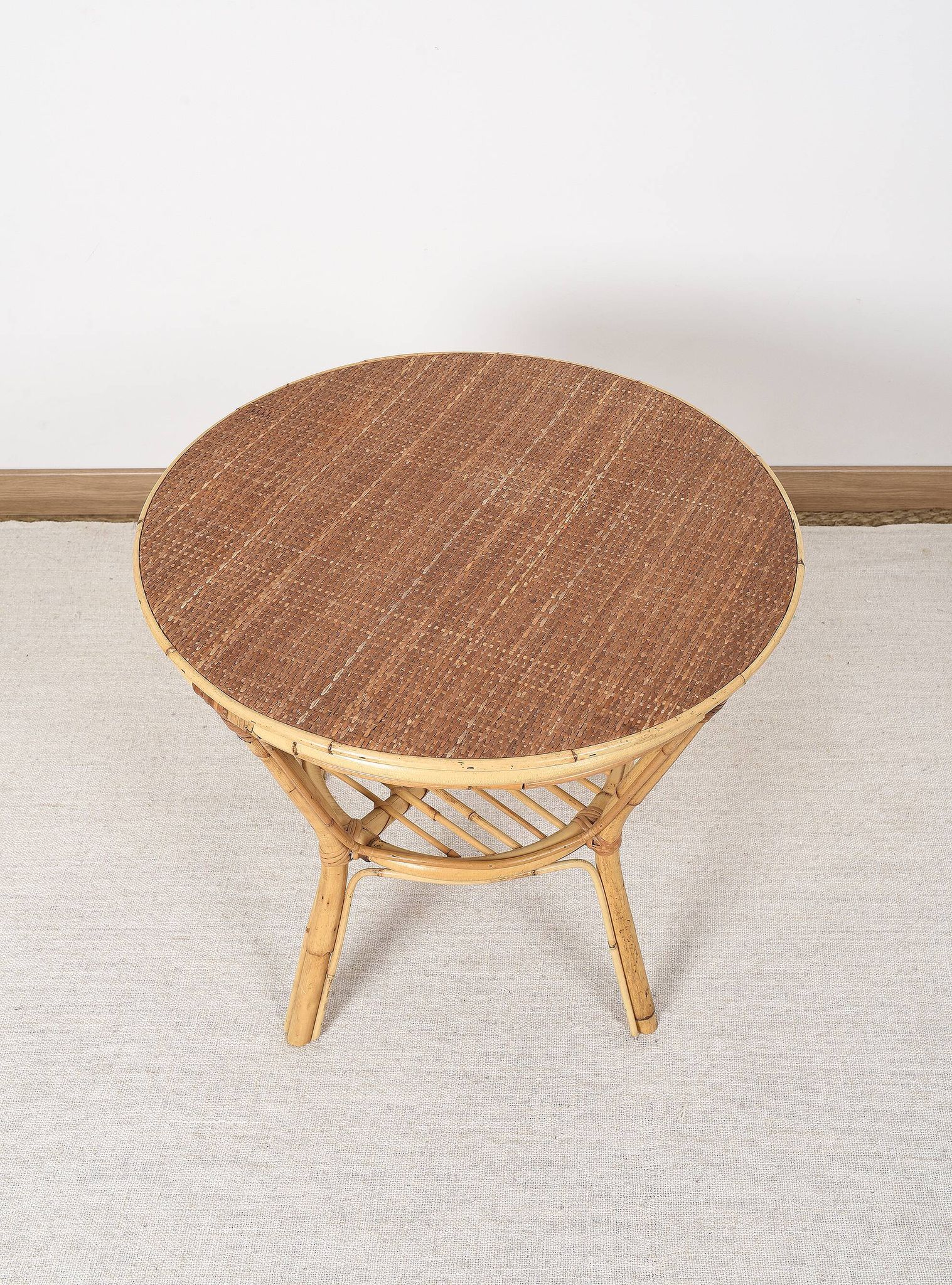 Old round rattan table, vintage from the 70s - 80s. Small table, or side table.