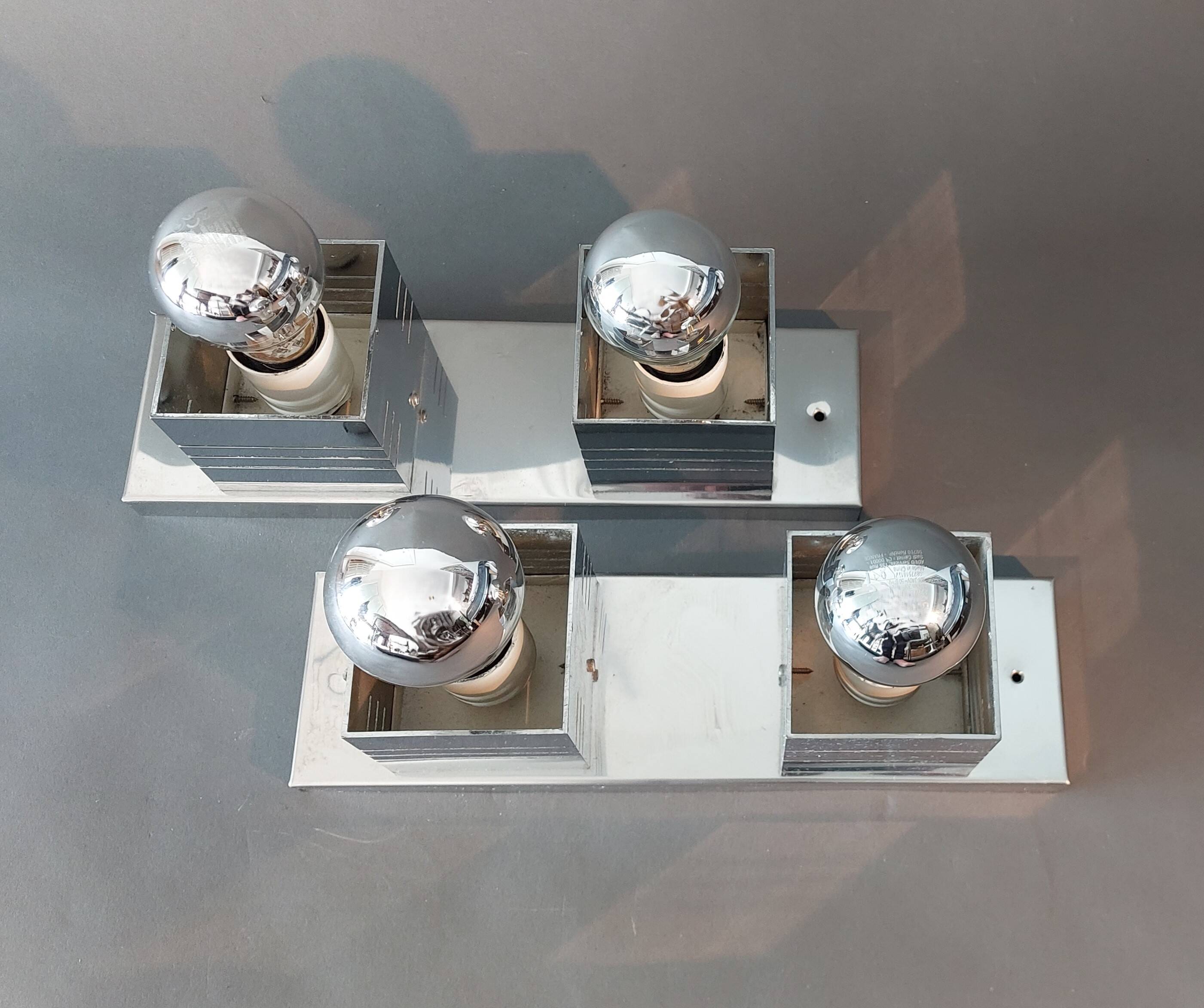 Pair of Spage Age 1970 chrome wall lights.