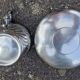 Cup and saucer in solid silver.