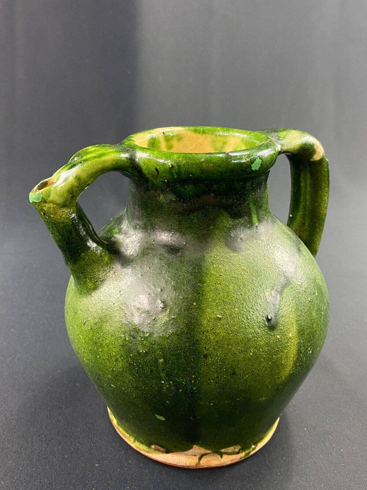 19th century green enamelled stoneware jug