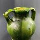 19th century green enamelled stoneware jug