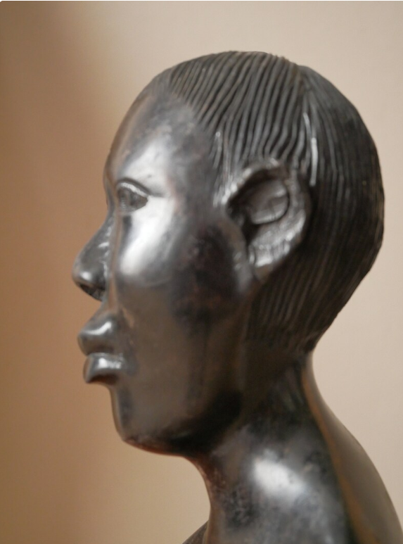 Bust of a woman in ebony African Art