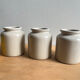 Old glazed stoneware mustard pots