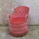 Old pink velvet armchair