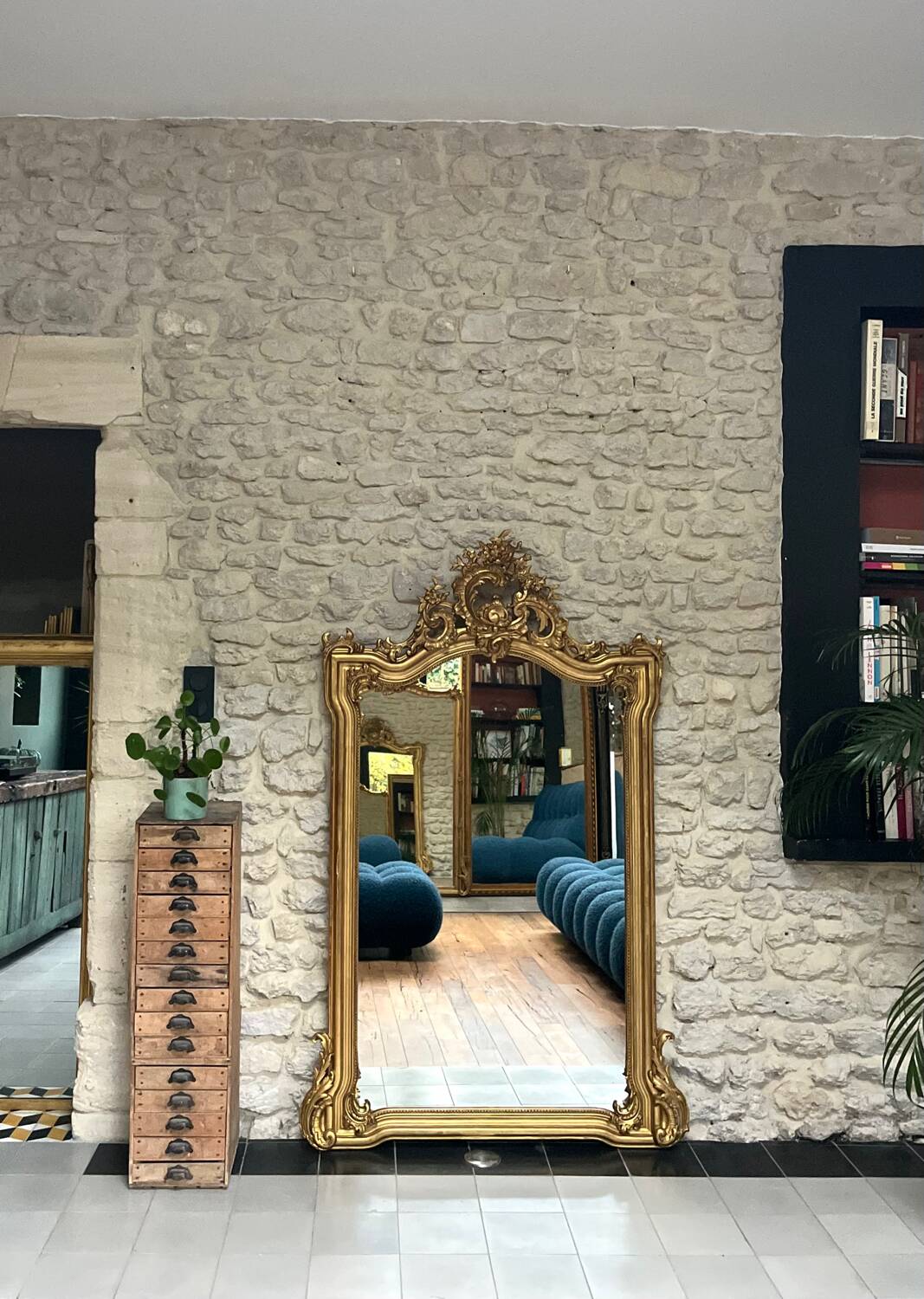 Antique mirror 169/105cm with pediments and pearl detailing in gold leaf.