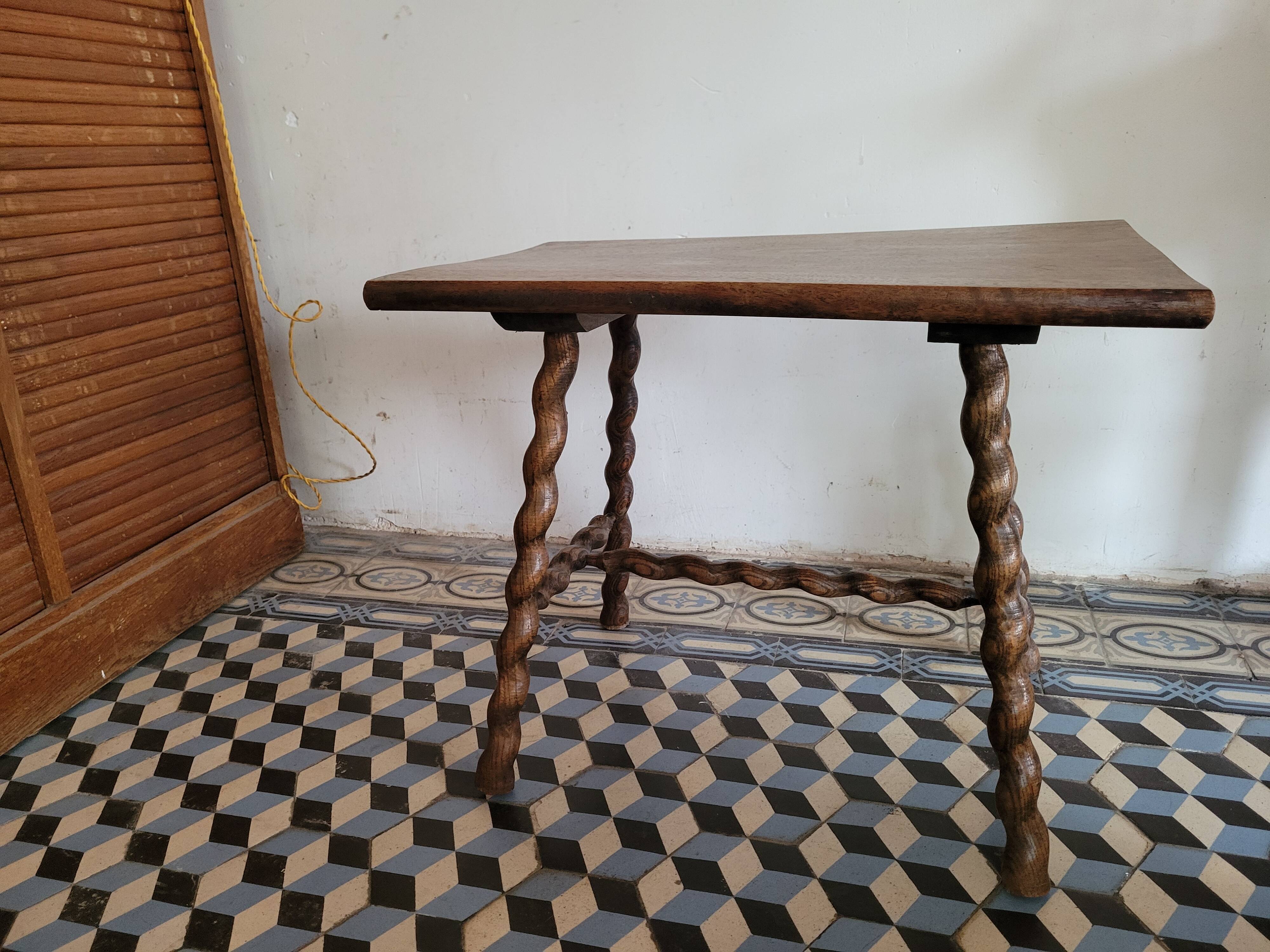 Brutalist coffee table with turned wooden legs