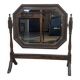 Antique beveled octagonal vanity mirror in carved wood