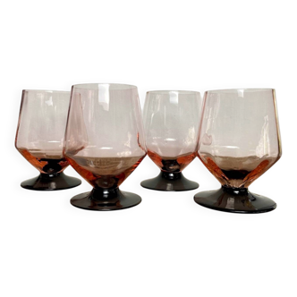 4 pink glasses with black stems