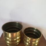Duo of brass pot covers