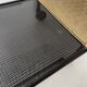 Perforated metal serving trolley in the Mathieu Matégot style