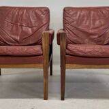 Fauteuils lounge danois vintage en palissandre et cuir. Années 1960.