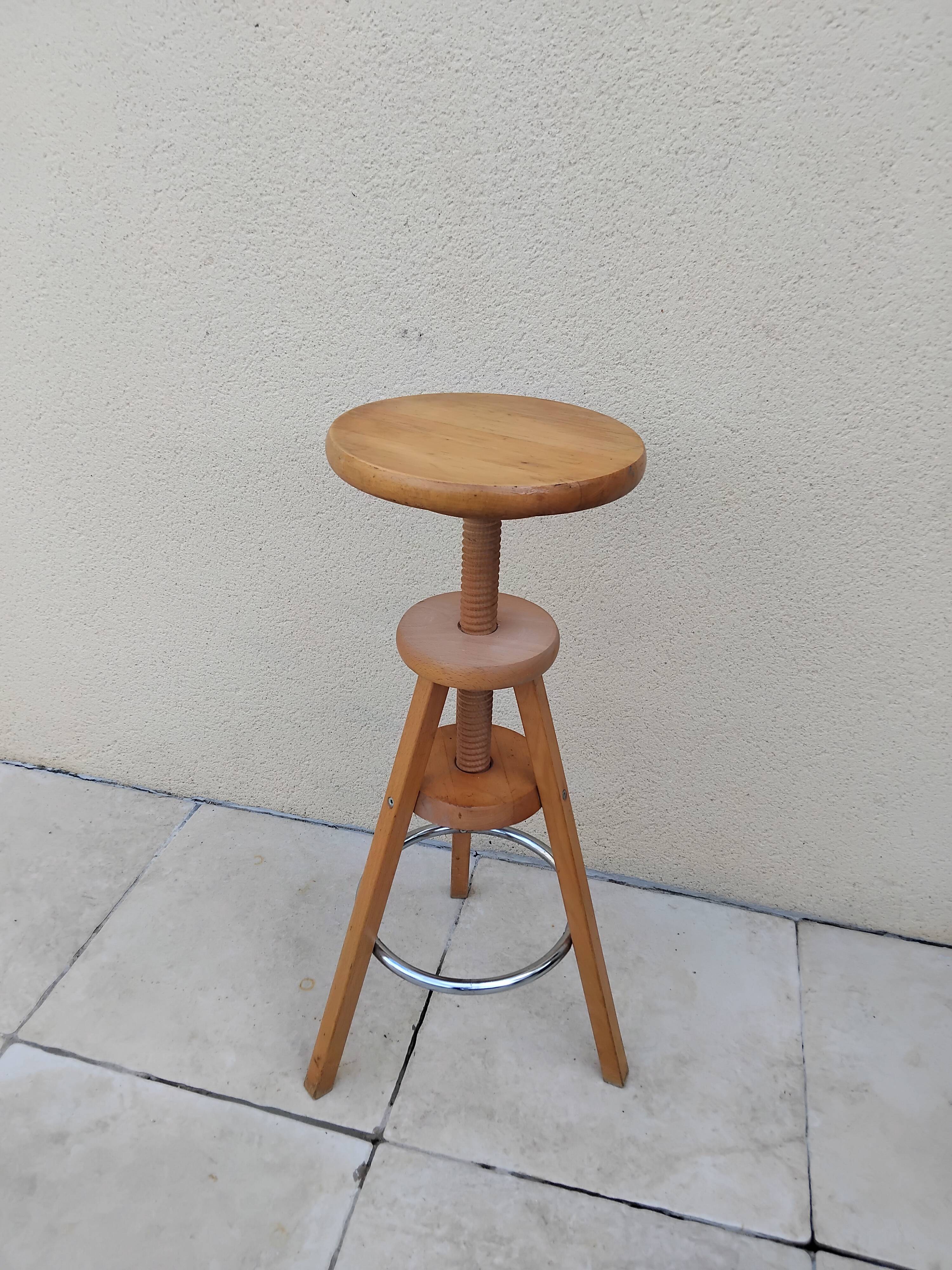 Adjustable tripod screw stool for painter artist workshop.